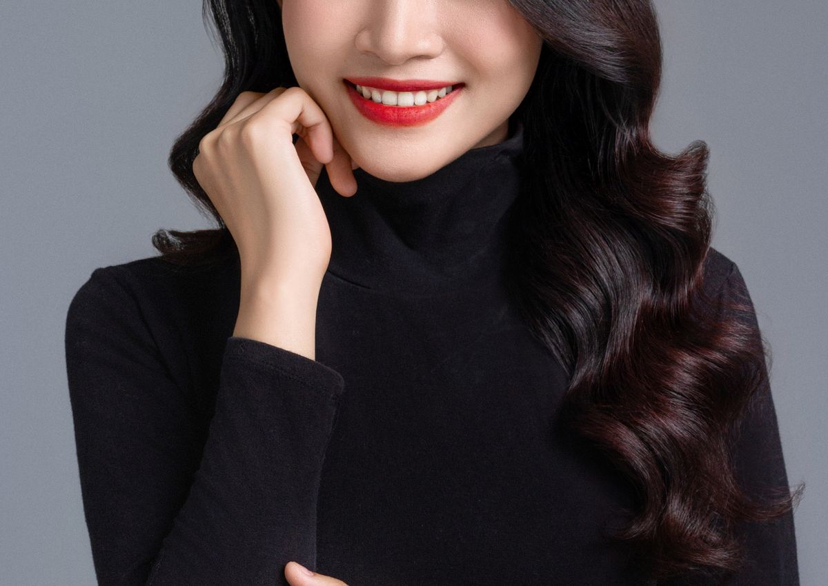 Confident straight smile after Invisalign clear aligner treatment at ID Dental in Koreatown, Los Angeles